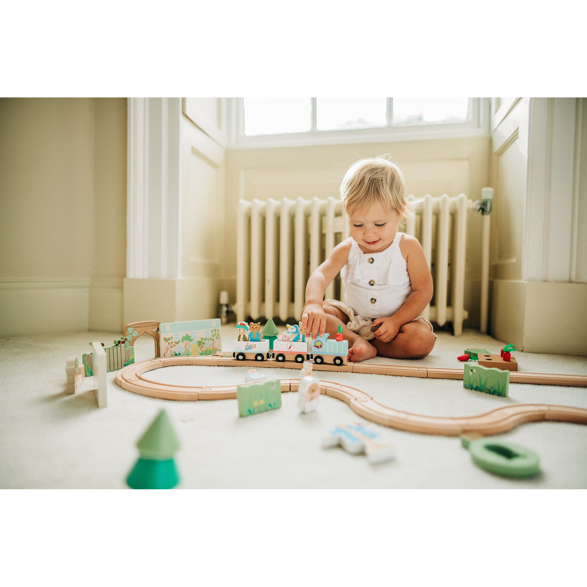 https://thelittleark.co.uk/cdn/shop/products/TRAINSET-PETERRABBIT_LIFESTYLE_5.jpg?v=1672418461&width=1946